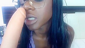 19yo black gal with sexy glasses fucking shaved pussy