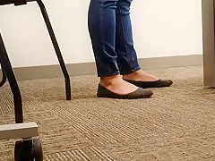 A Look At An Office Managers Well Worn Black Ballet Flats