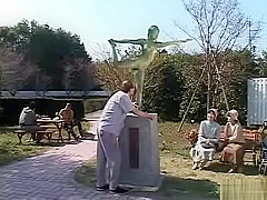 A living nude female Japanese garden statue