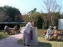 A living nude female Japanese garden statue