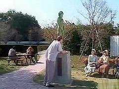 A living nude female Japanese garden statue