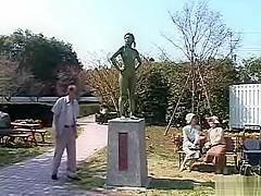 A living nude female Japanese garden statue