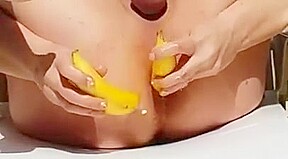 Anal banana and speculum in the garden