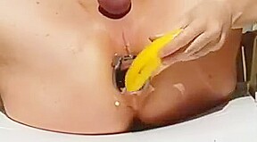 Anal banana and speculum in the garden