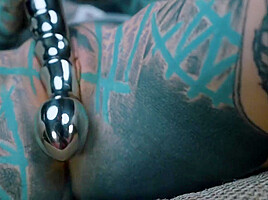 Anuskatzz Shoves A Stainless Steel Dildo Up Her Ass