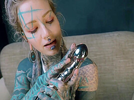 Anuskatzz Shoves A Stainless Steel Dildo Up Her Ass