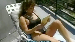 Ashlyn Gere masturbating while lying on sun lounger