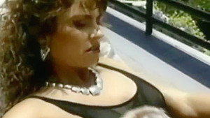 Ashlyn Gere masturbating while lying on sun lounger