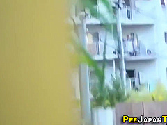 Asian Babe Pees Publicly