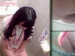 Asian In Uniform Peeing