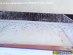 Asian Skank Pissing In Receptacle - Shino Nakamura