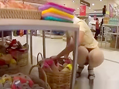 Asian store worker upskirt