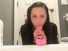 Babe fucks pink dildo