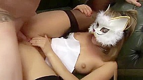 Babe in cat mask takes good care of guy's stiff tool