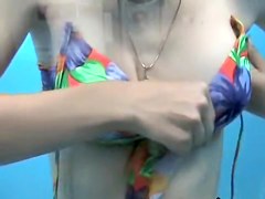 Beach change cabin camera giving hot view on amateur tits
