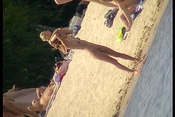 Beach porno video of a white skinny fit nude bitch in sunglasses