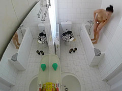 Beautiful housewife removes her clothes in order to wash her juicy holes