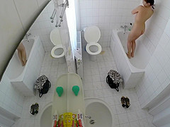 Beautiful housewife removes her clothes in order to wash her juicy holes