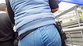 Beautiful lady ass in blue jean walking