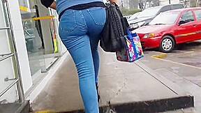 Beautiful lady ass in blue jean walking