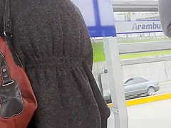 Big ass chick wearing gray leggings