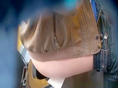 Big ass woman peeing public toilet