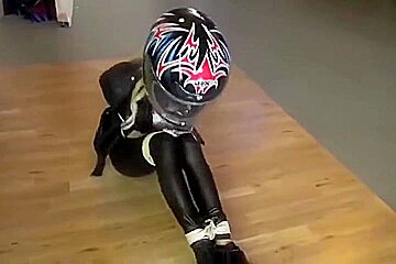 Biker Girl Gets Roped And Tape-gagged In Helmet