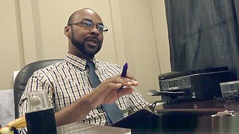 Black doctor drills hole