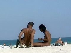 Black girl nude on a beach