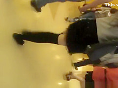 Black panties under short black dress