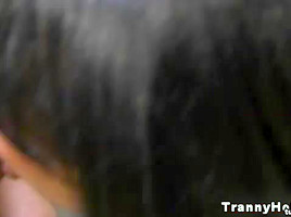 Black tranny sucking his hard white cock