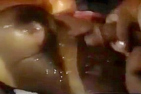 Black woman covered in cum