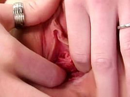 Blond junior nurse Kristyna inserts speculum in her pussy