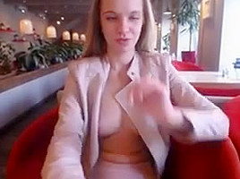 Blonde girl restaurant public play