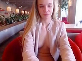 Blonde girl restaurant public play
