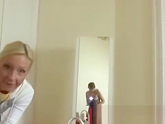 Blonde milf dressing up with stockings