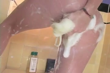 Breasty Golden-Haired Taking A Shower