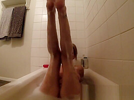 Brett Rossi takes a hot bath that makes her real horny