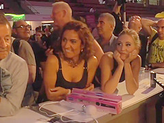 Brunette babe anal fucked at sex expo
