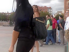 Brunette hottie licking mistress in public
