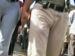 Bubble butt honey in tight white pants stars in a candid street vid