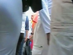Bubble butt honey in tight white pants stars in a candid street vid