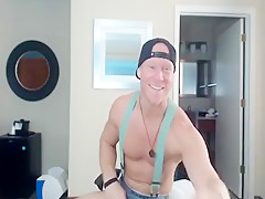 CG69 wearing a jockstrap with suspenders on cam