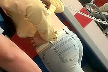 Candid ass wrapped in blue tight jeans caught in the street