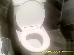 Charming lady with a white hat takes a leak