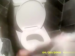 Charming lady with a white hat takes a leak