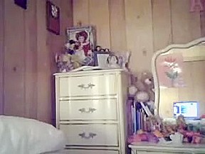 Chocolatey chick licks her tits