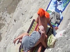 Cock sucking on the beach