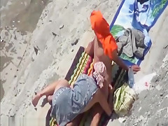 Cock sucking on the beach