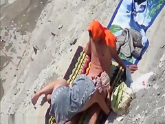 Cock sucking on the beach